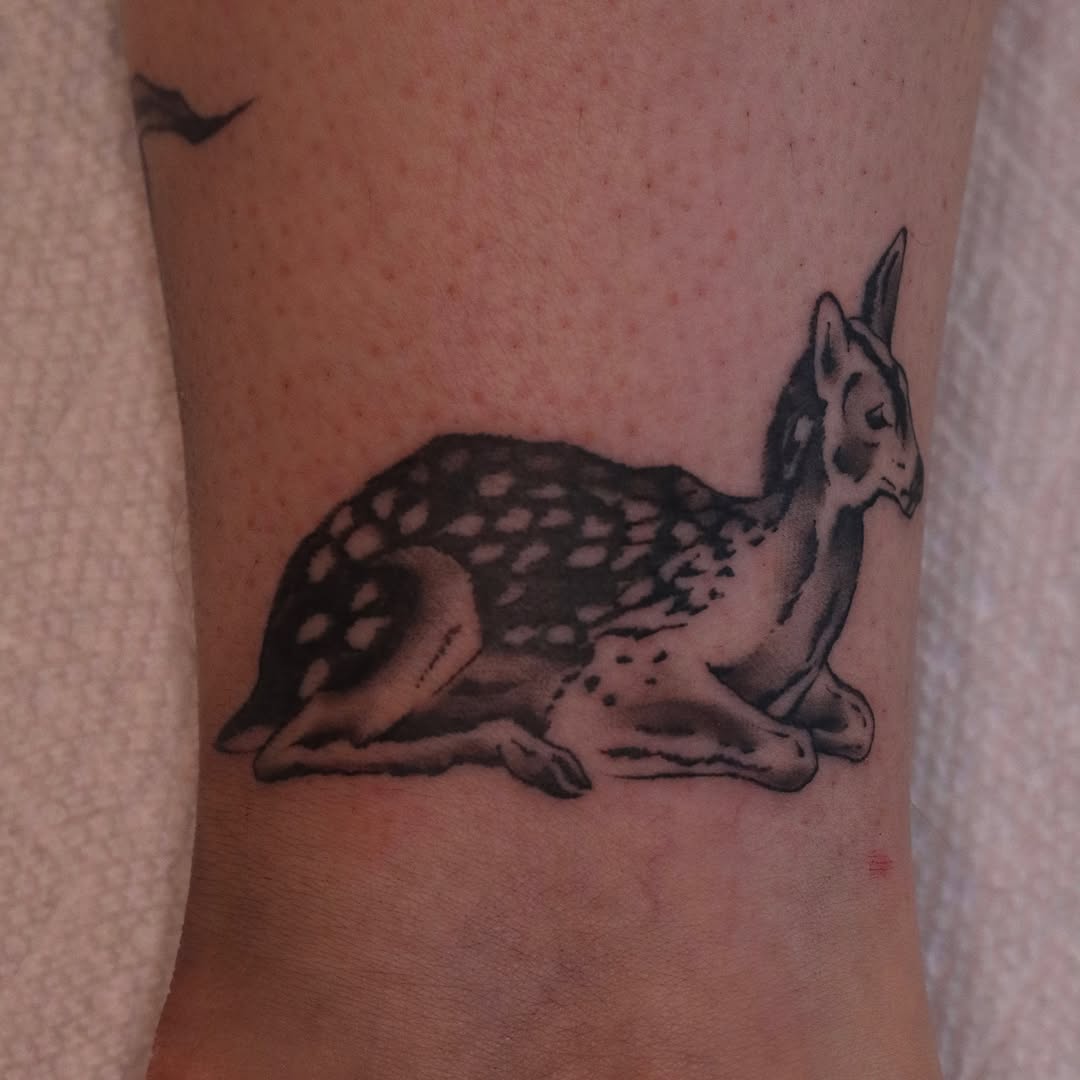 Tattoo by @nik.checots — realism, black_and_grey