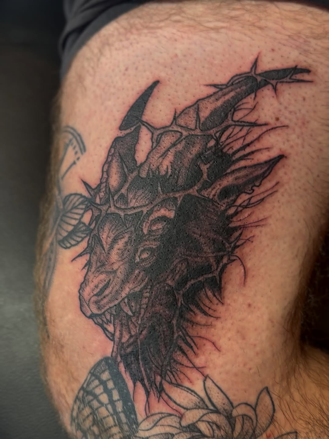 Tattoo by @loveyoutodeathtattoo — dark_realism, black_and_grey
