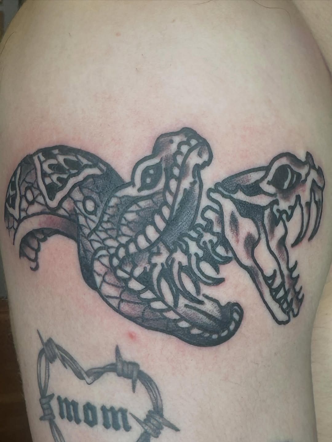 Tattoo by @jeffrey_dt_314 — black_and_grey, neo_traditional