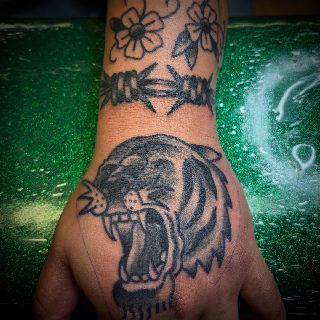 Tattoo by @tuff_tatz — american_traditional, black_and_grey