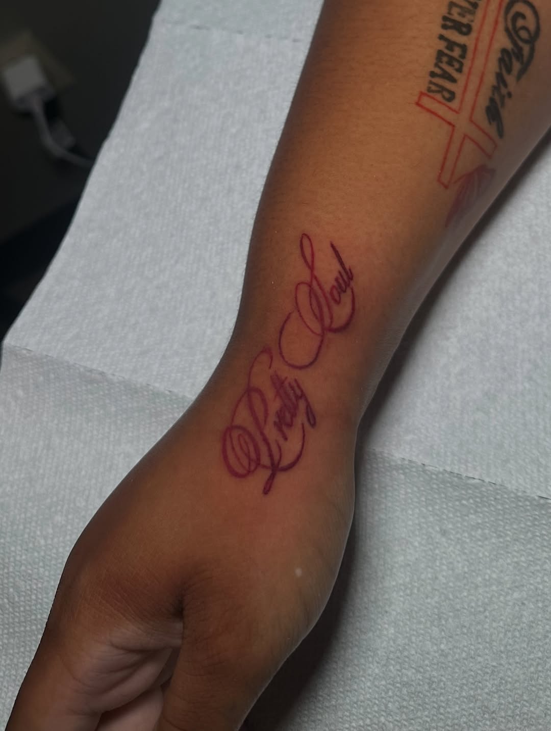 Tattoo by @tattedbytuck — lettering_script, fine_line