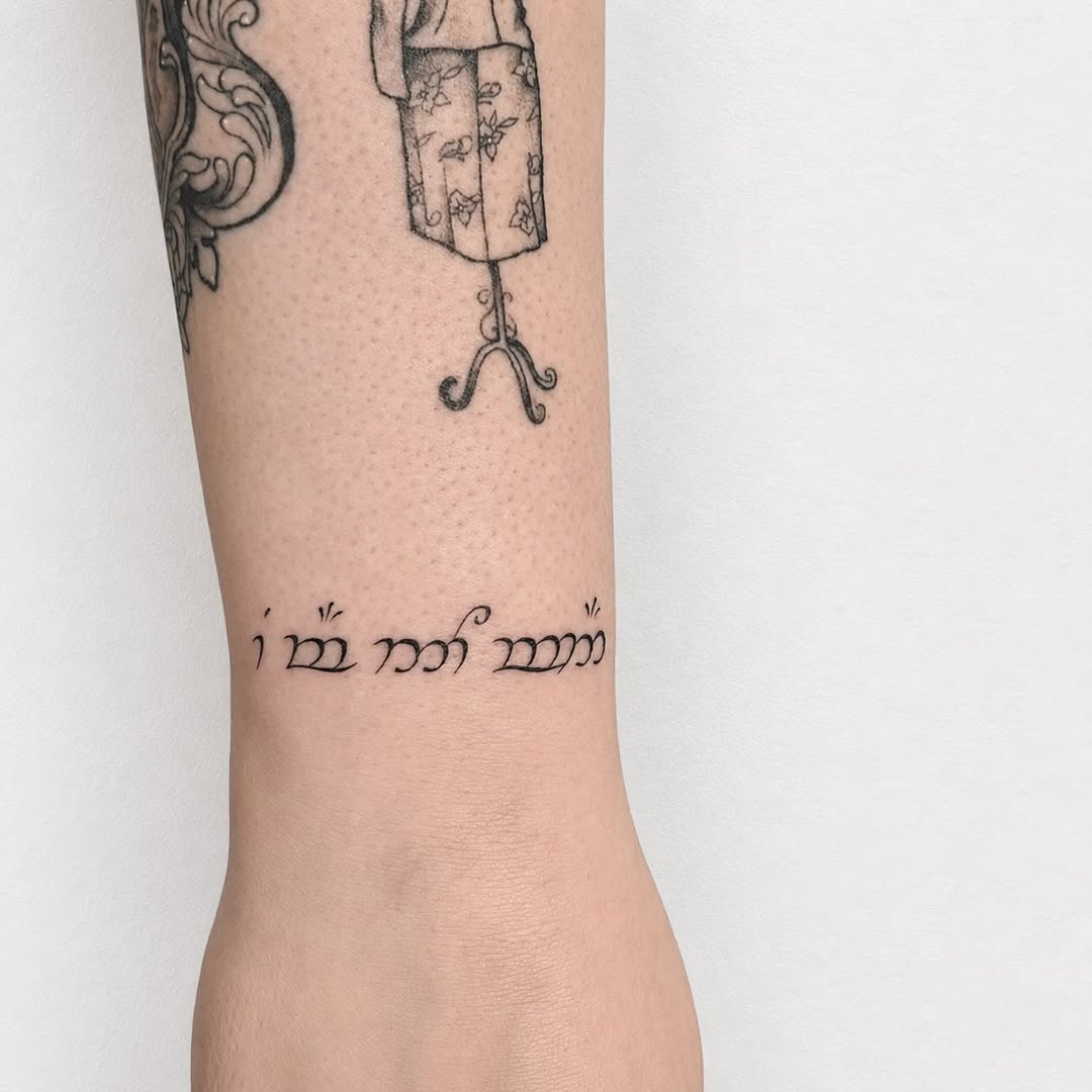 Tattoo by @jonny_elliott_phx — lettering_script, fine_line