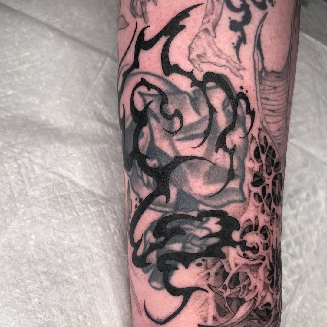 Tattoo by @revoltingworship — blackwork, dark_realism