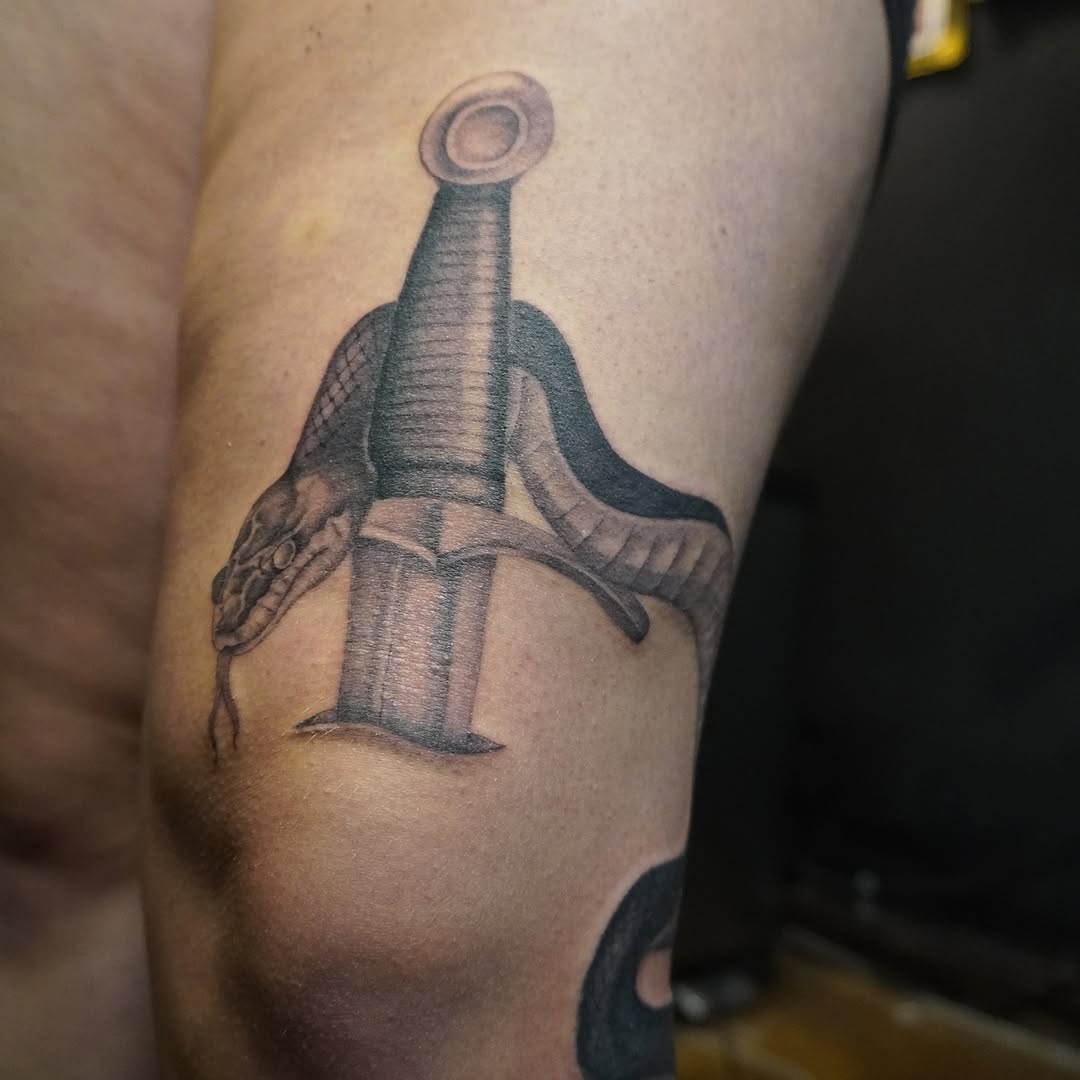 Tattoo by @adrian__tattoos — realism, black_and_grey