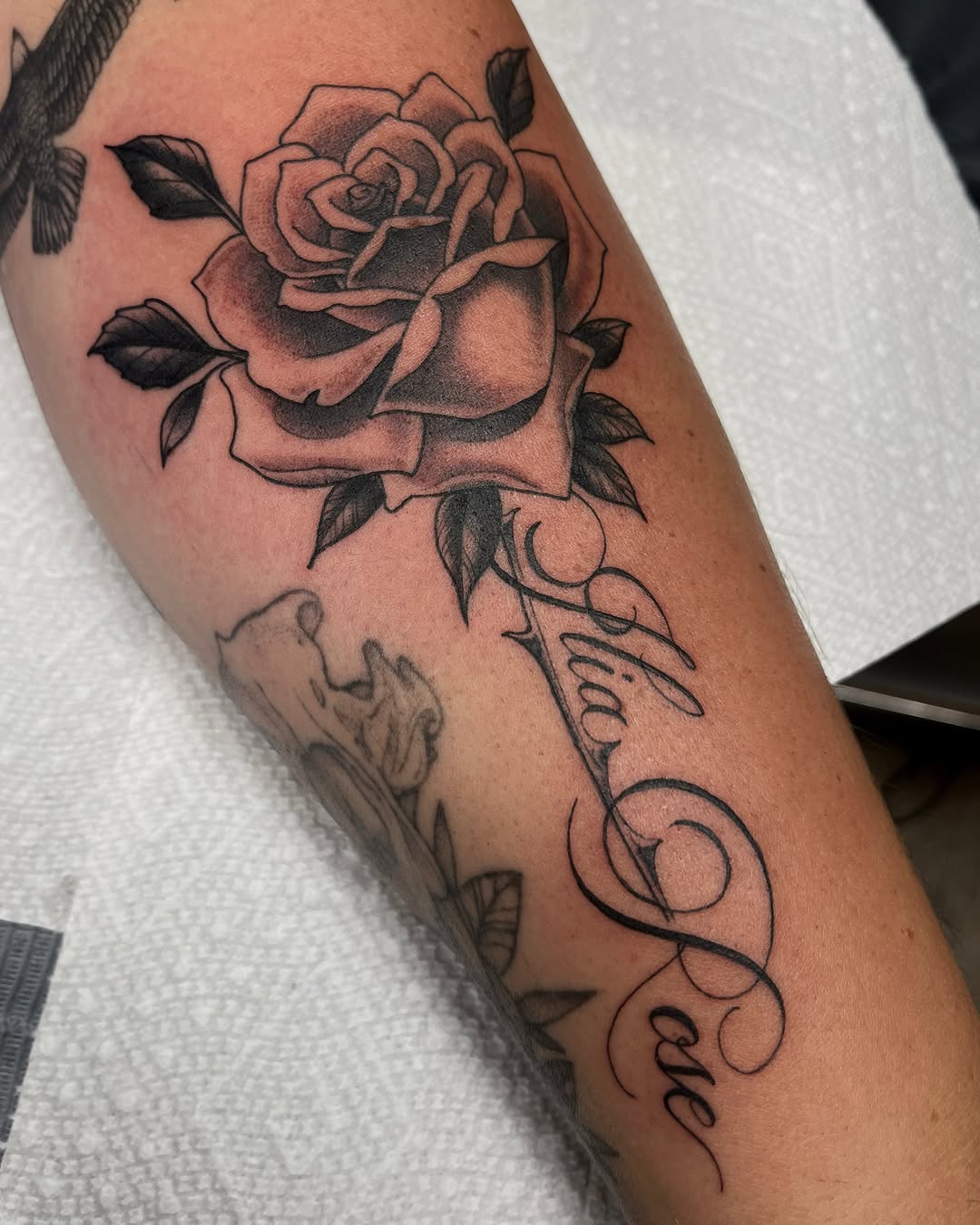 Tattoo by @mac.widow โ black_and_grey, lettering_script