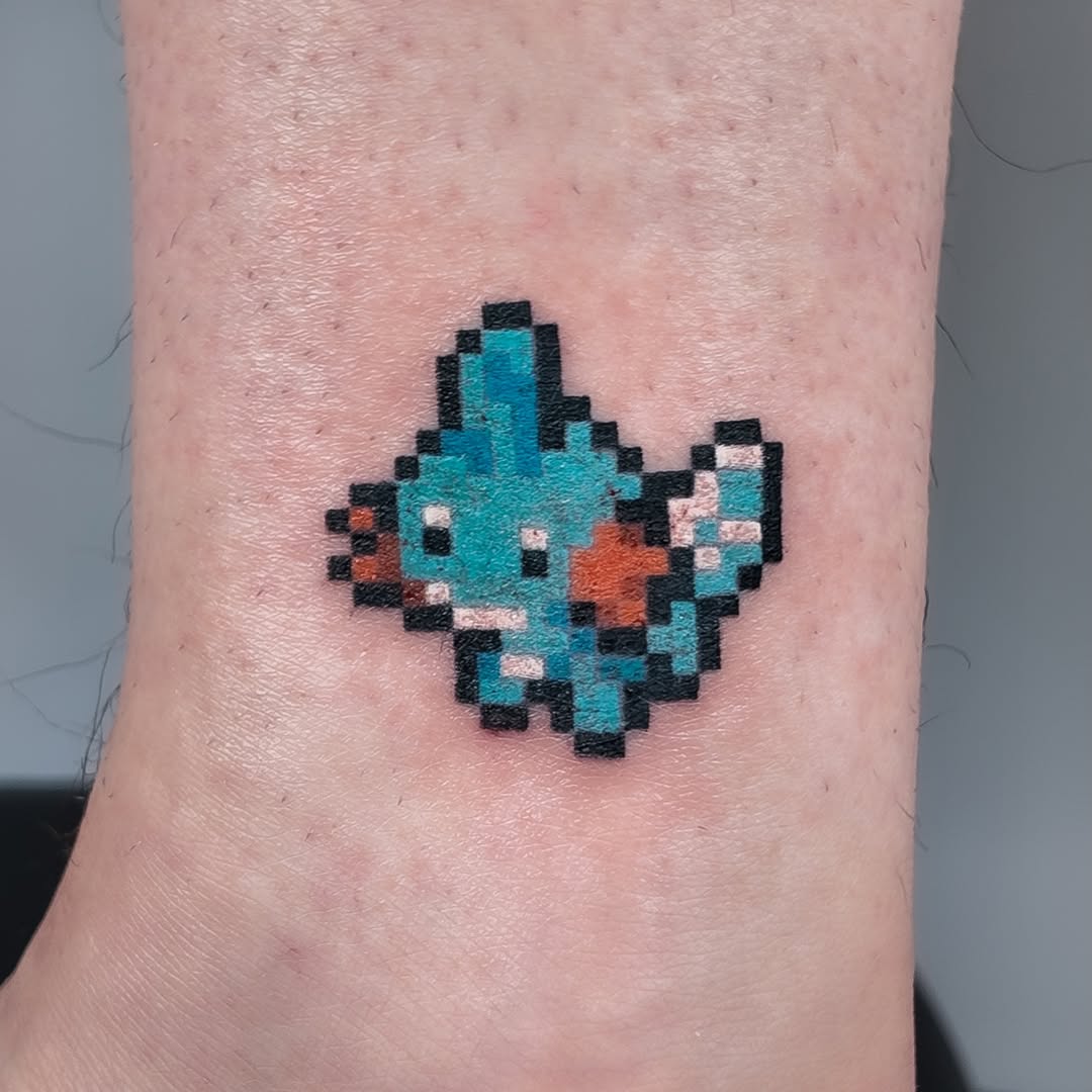 Tattoo by @mrpixel.tattooer β anime, pixel_art