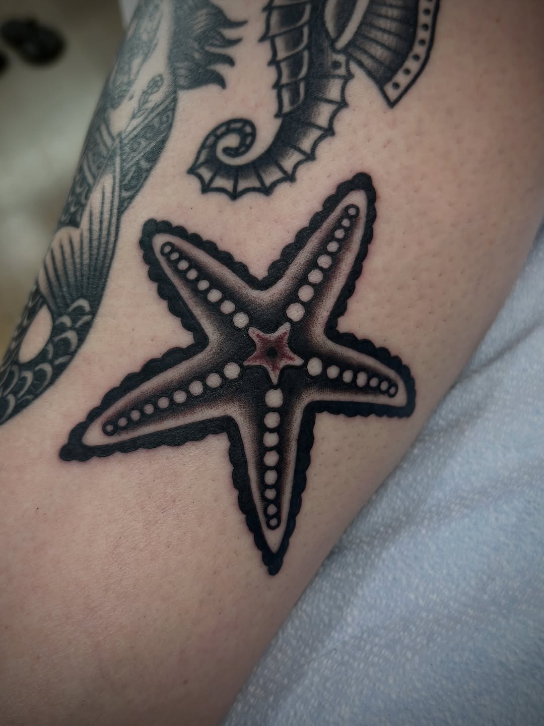 Tattoo by @jmcneely.tats — american_traditional, black_and_grey