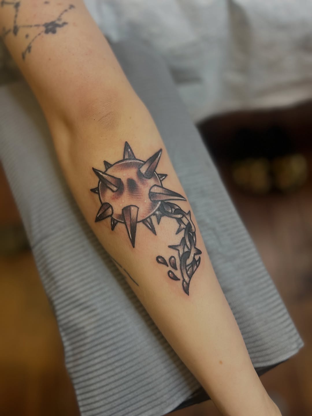 Tattoo by @fizzy_jizzles_wtc — dark_realism, black_and_grey