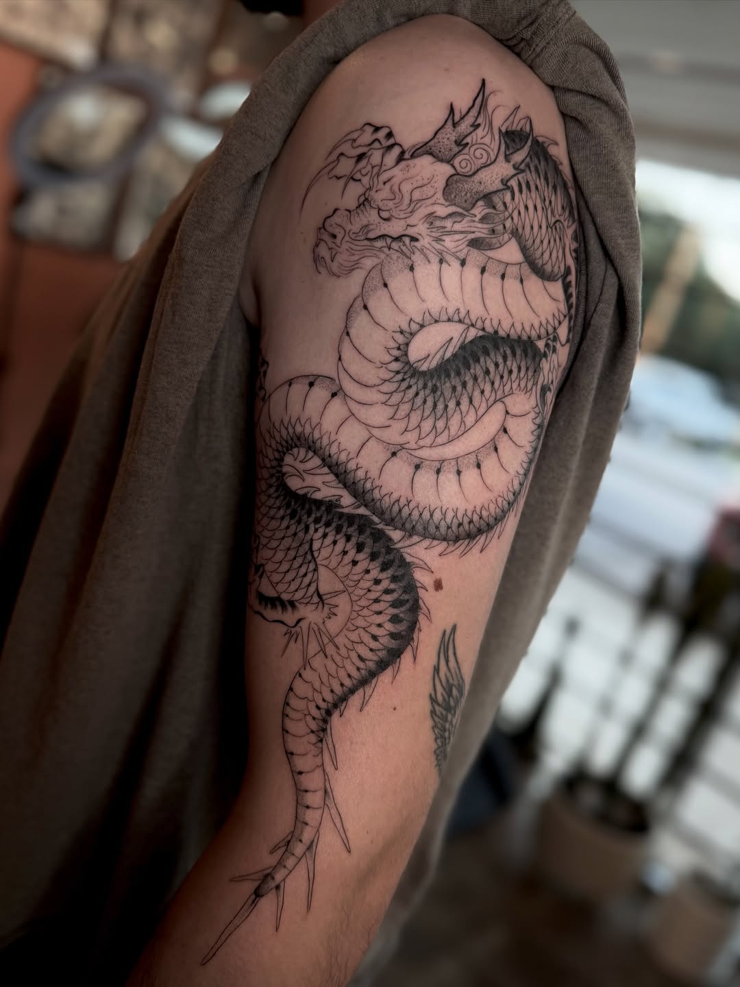 Tattoo by @ttt.christian — japanese_irezumi, dotwork