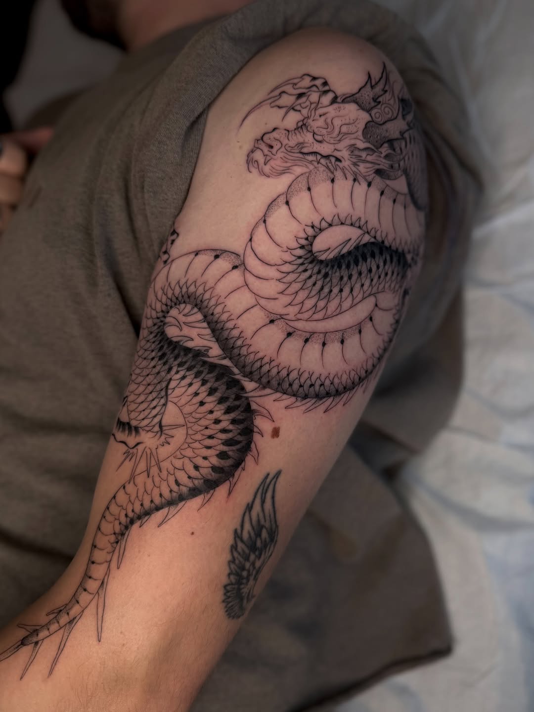 Tattoo by @ttt.christian — japanese_irezumi, dotwork