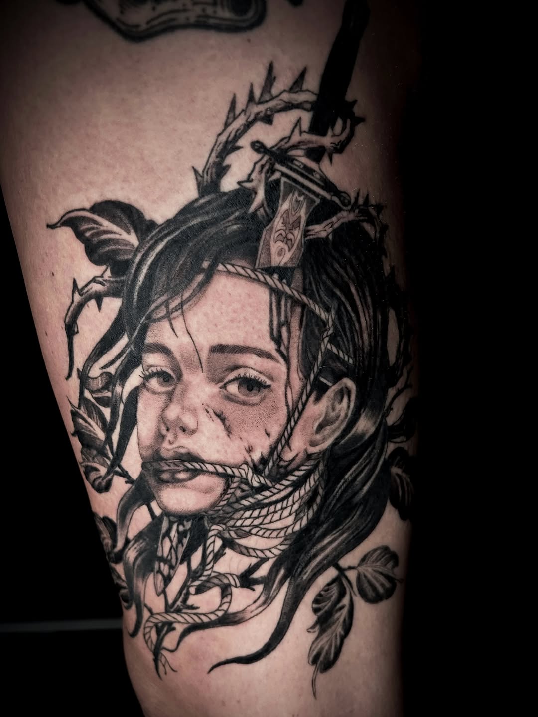 Tattoo by @clack.clack.clack — dark_realism, black_and_grey