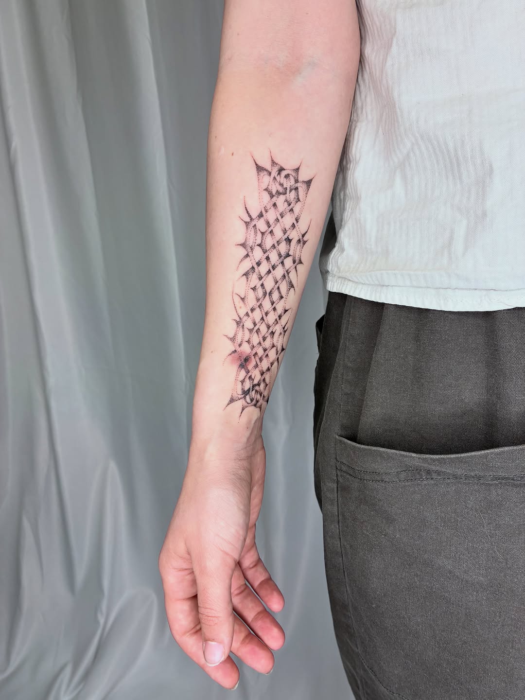Tattoo by @geisha_ocelotl — dotwork, geometric