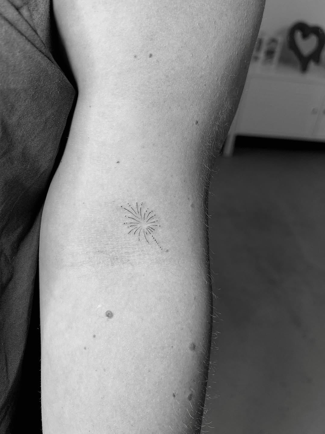 Tattoo by @elliemay.tatts โ fine_line, dotwork
