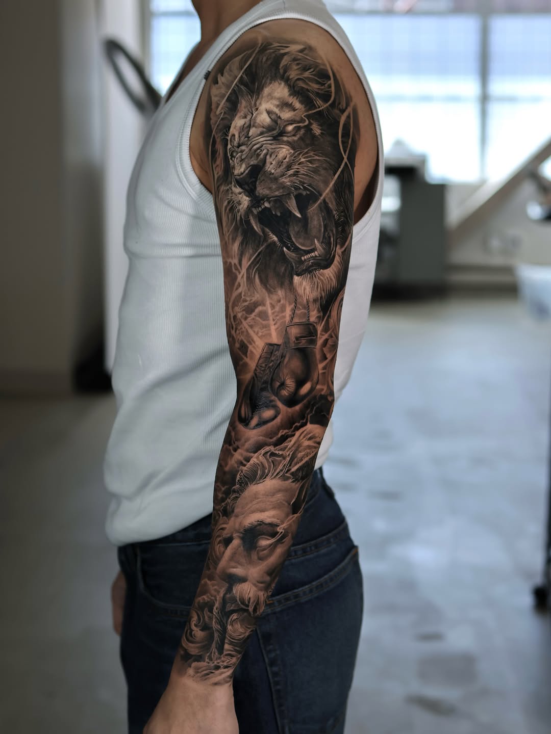 Tattoo by @tattooist_reset — realism, black_and_grey