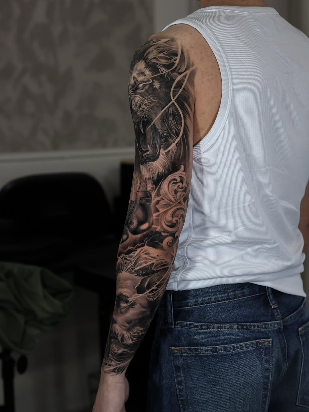 Tattoo by @tattooist_reset — realism, black_and_grey