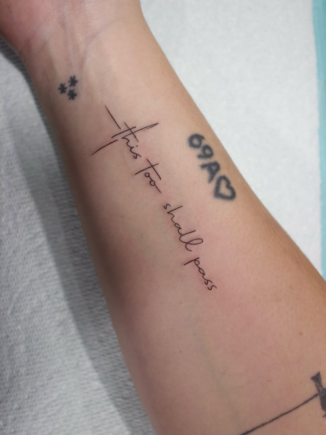 Tattoo by @emsky_ink โ lettering_script, fine_line
