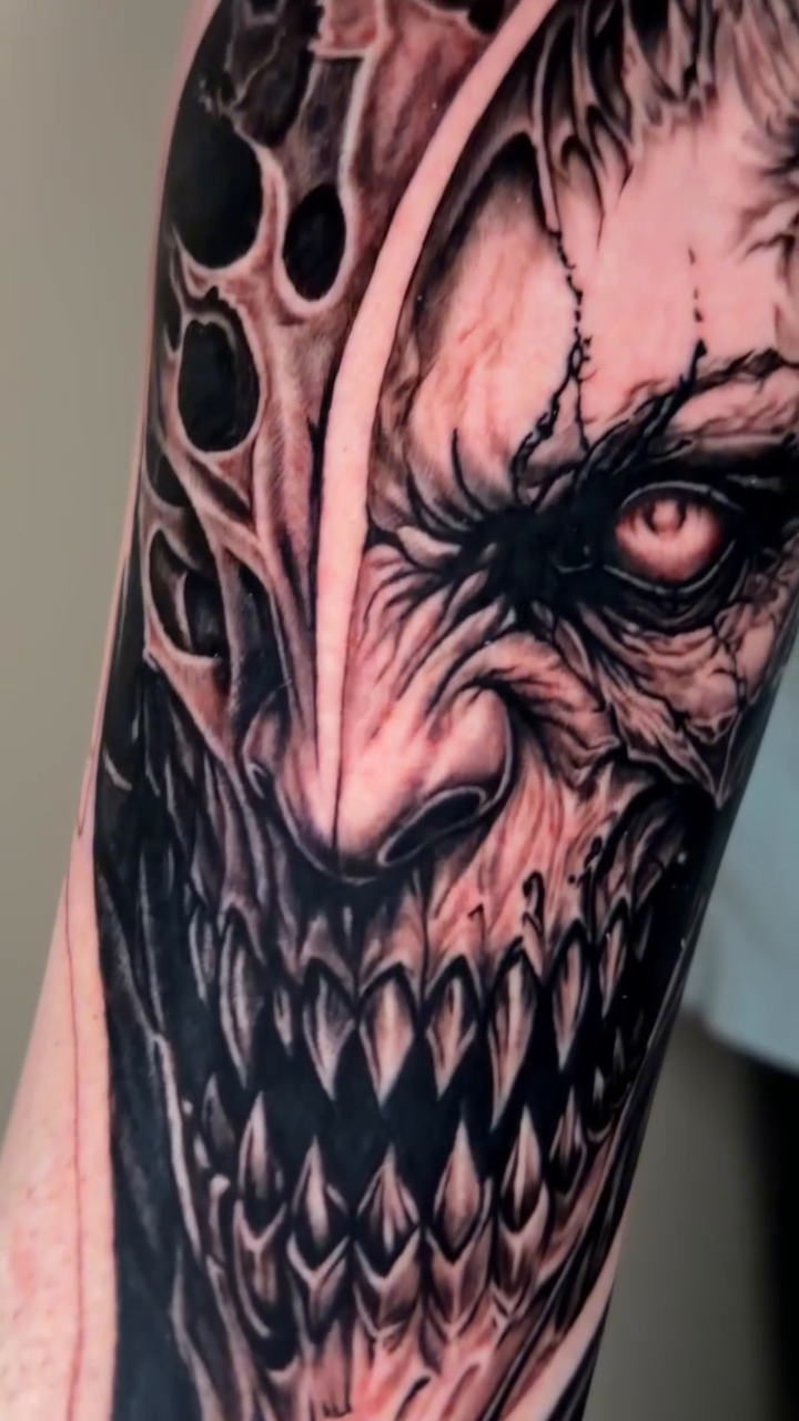 Tattoo by @kevbo.smith — dark_realism, black_and_grey
