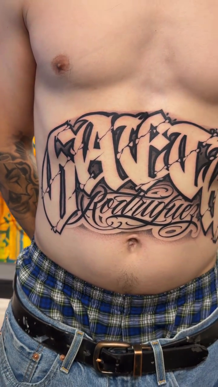 Tattoo by @aleckzi_ramos — lettering_script, chicano
