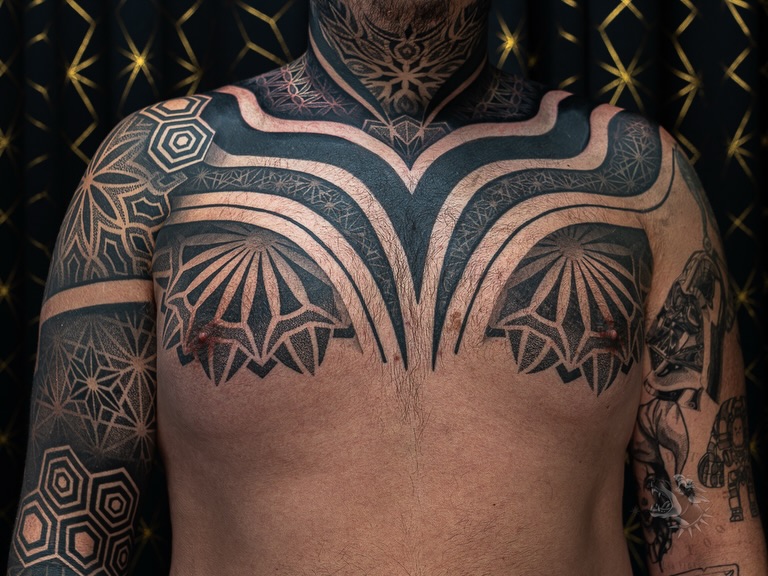 Tattoo by @sacredhound.ttt — geometric, blackwork