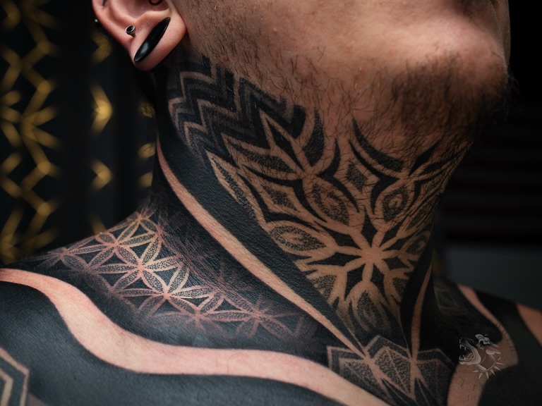 Tattoo by @sacredhound.ttt — blackwork, geometric