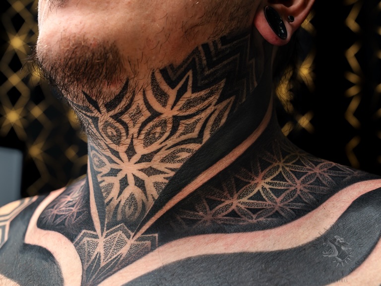 Tattoo by @sacredhound.ttt — blackwork, geometric