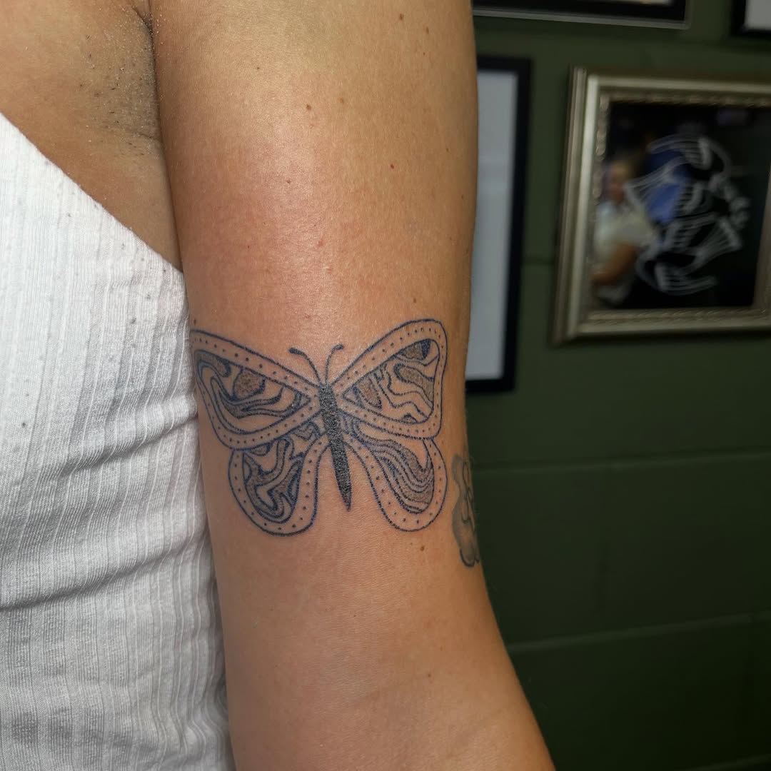 Tattoo by @permanent_pokes_ — dotwork, black_and_grey
