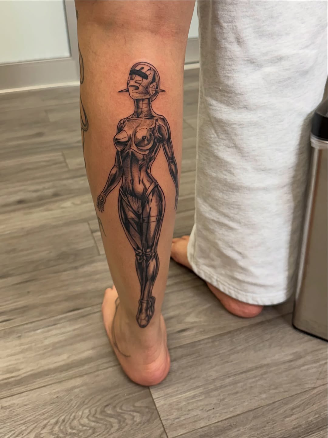 Tattoo by @gluhd_ink — realism, black_and_grey