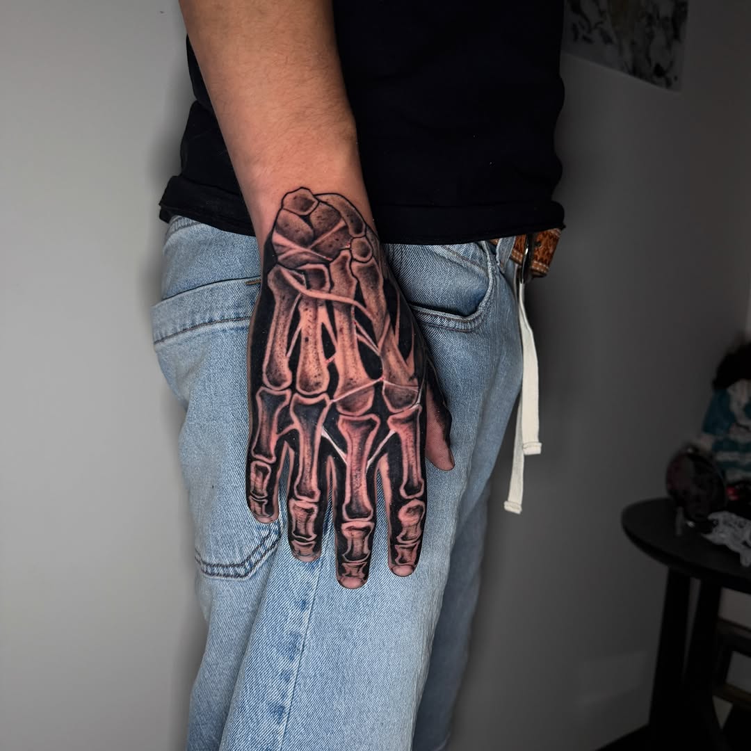 Tattoo by @tatts.x.hustler โ realism, black_and_grey