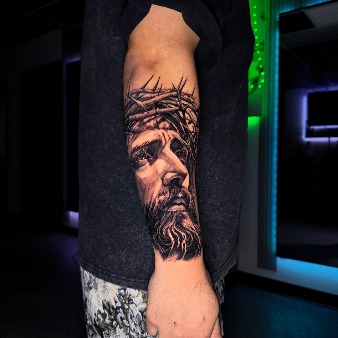 Tattoo by @tatts.x.hustler โ realism, black_and_grey