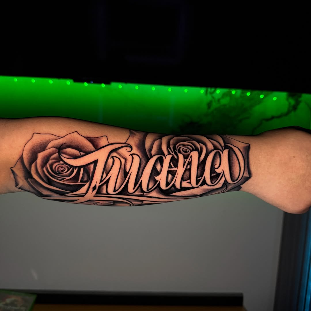 Tattoo by @tatts.x.hustler โ lettering_script, black_and_grey