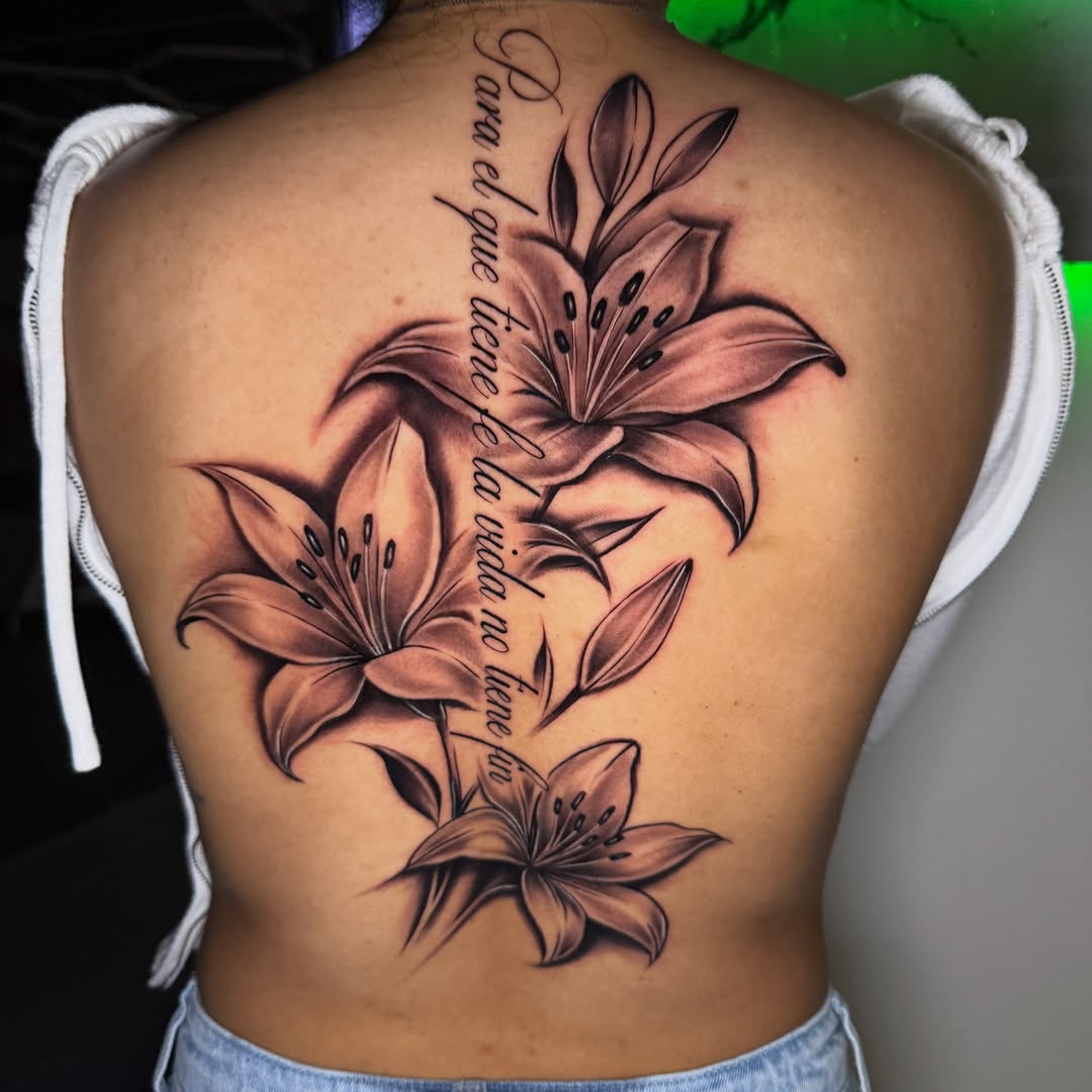 Tattoo by @tatts.x.hustler โ black_and_grey, lettering_script