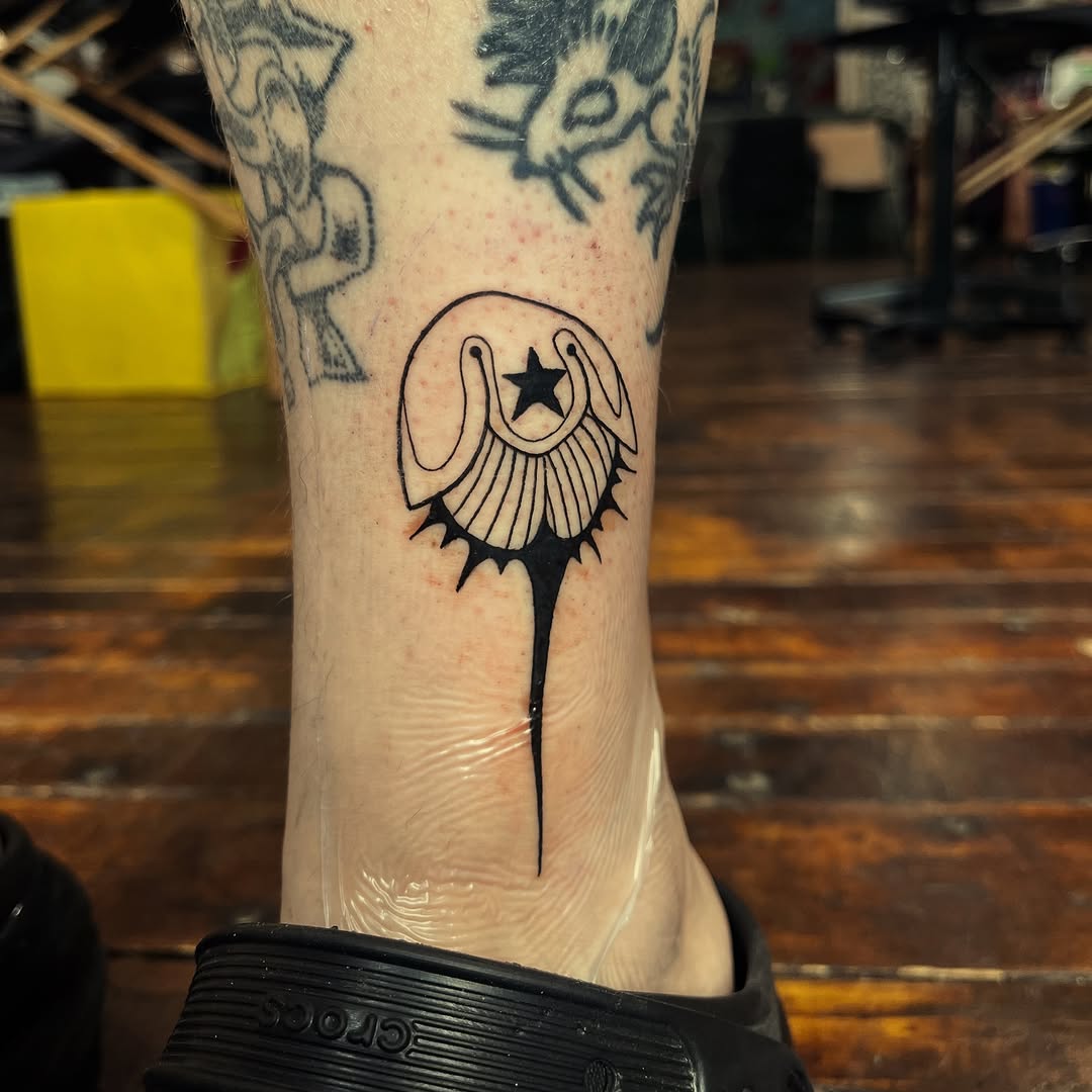 Tattoo by @cow.boy.ink — blackwork