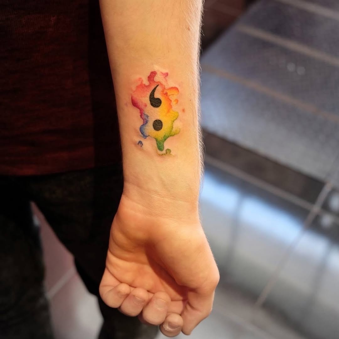 Tattoo by @stitchme.aizen_nyc — watercolor