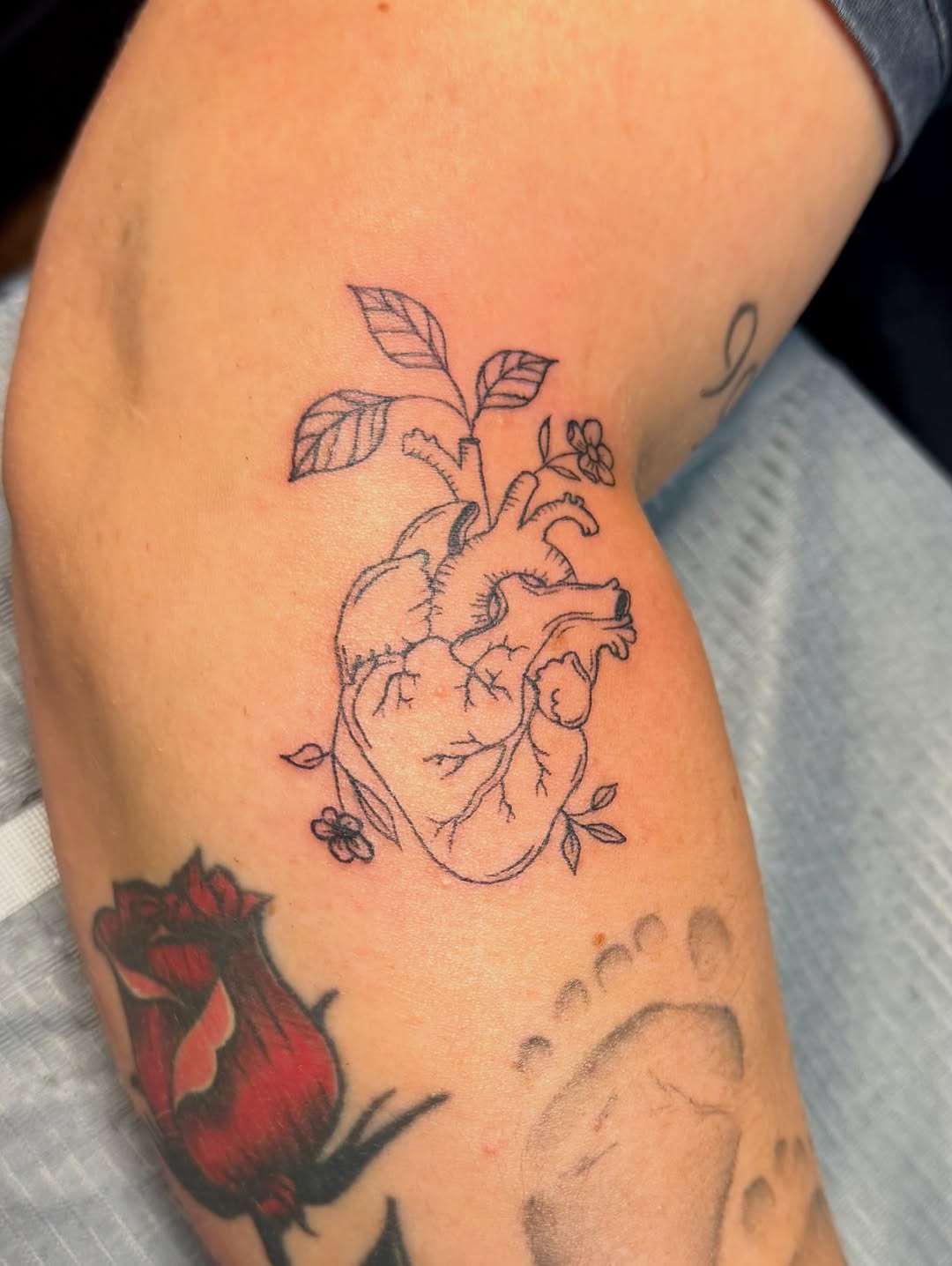 Tattoo by @adriennesmith.ink — fine_line, black_and_grey