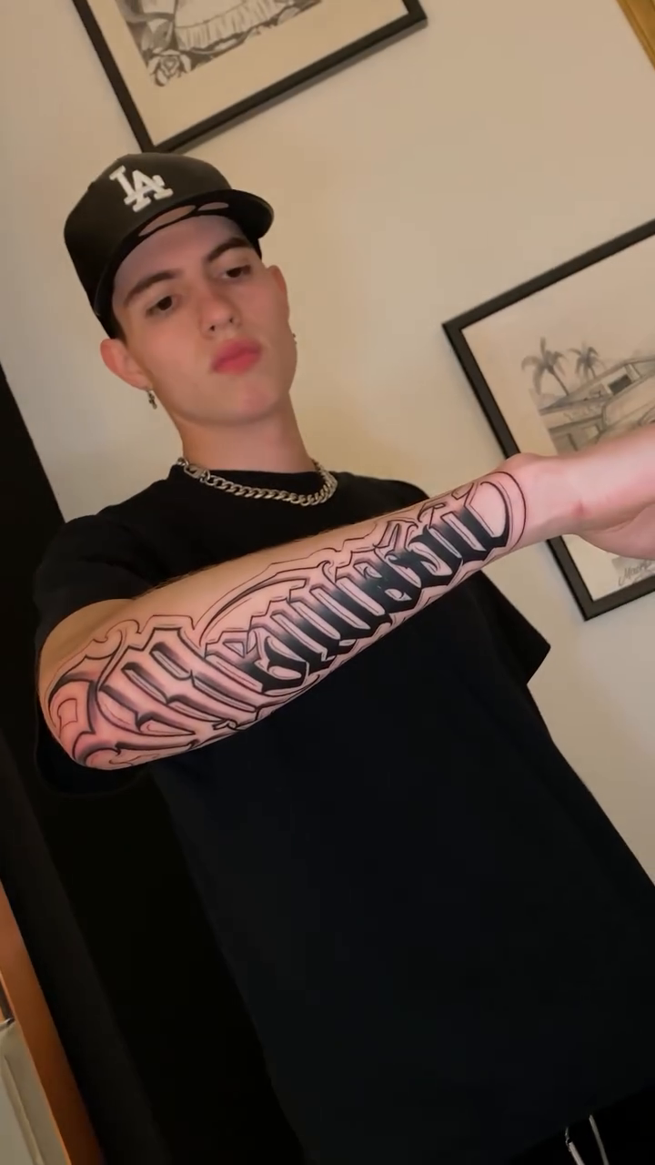 Tattoo by @sionerdcd — chicano, lettering_script