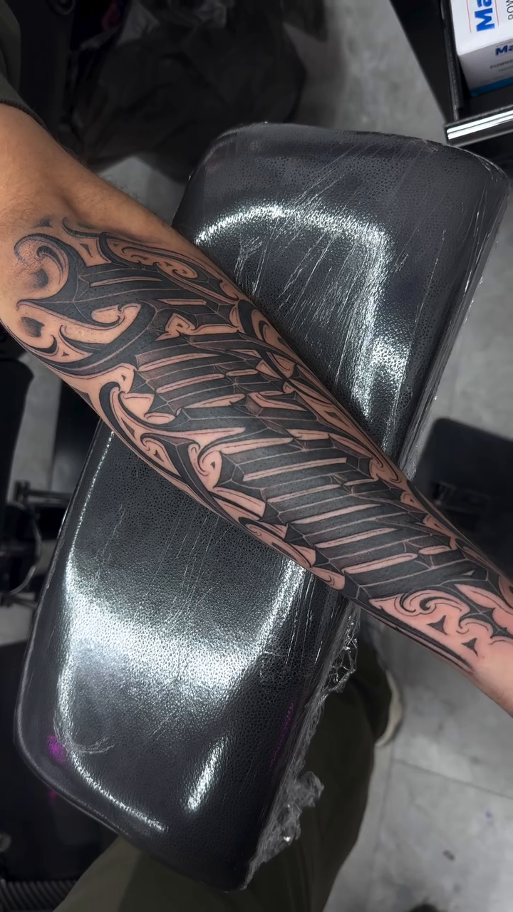 Tattoo by @dopeletterstattoo — tribal, blackwork
