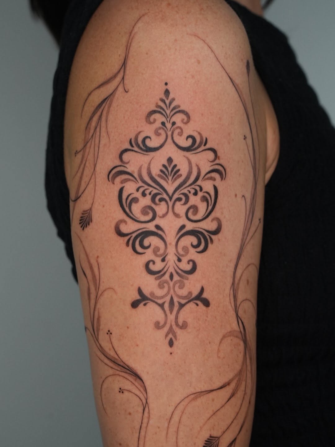 Tattoo by @tattooer_r.tee — ornamental, fine_line