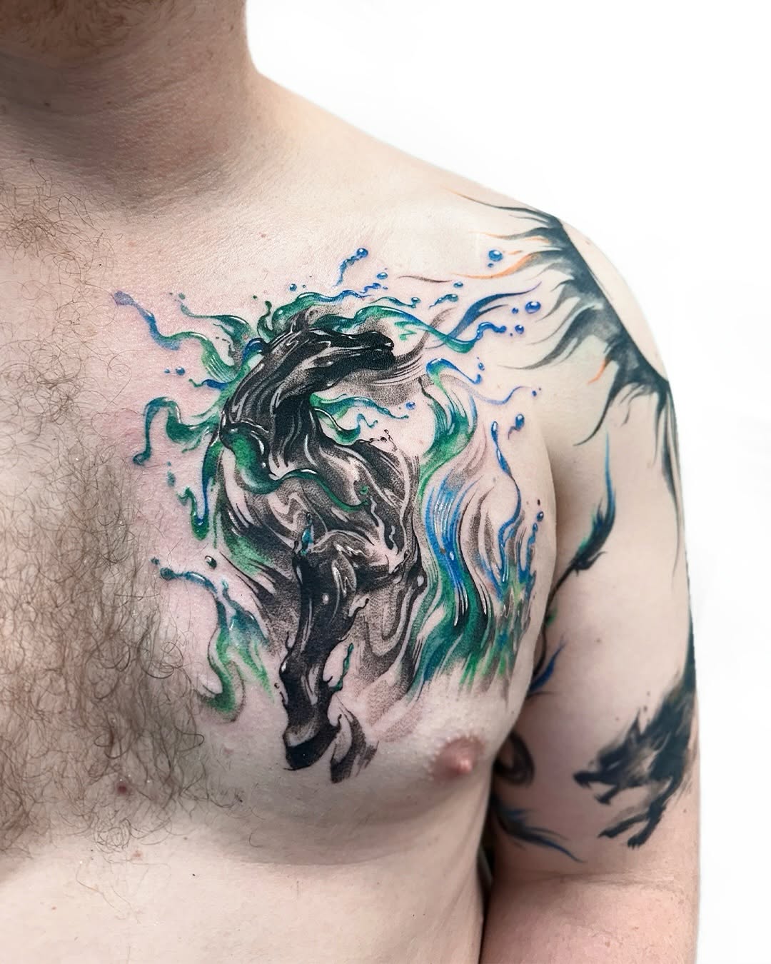 Tattoo by @uzo.ink — blackwork, watercolor