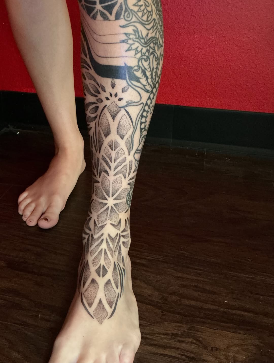 Tattoo by @saylorvaughn.ink — dotwork, geometric