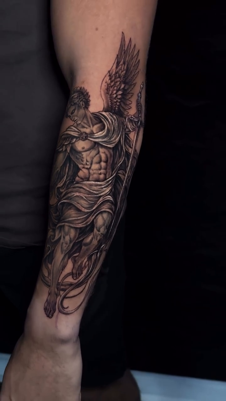 Tattoo by @grimlayertattoo — realism, black_and_grey