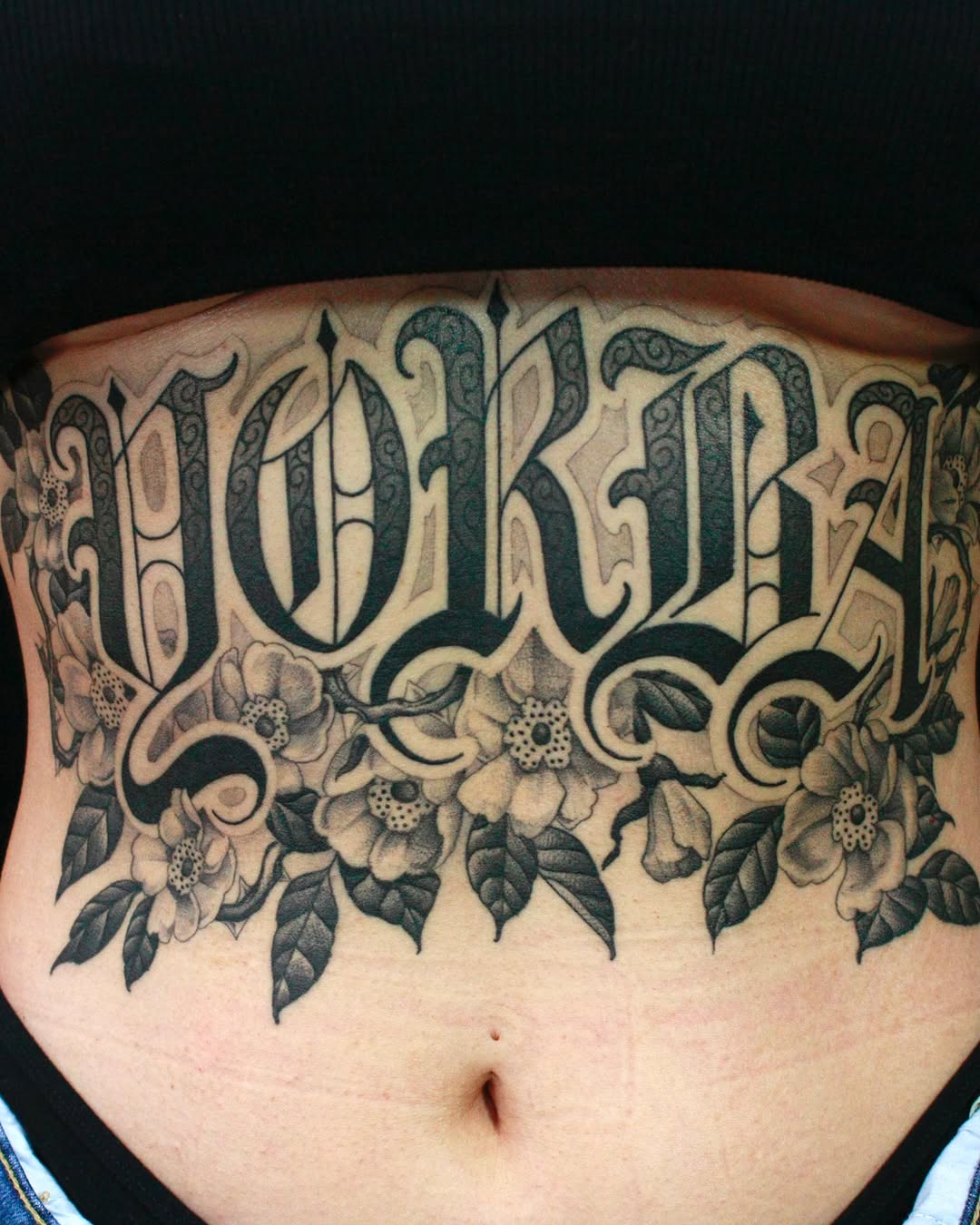 Tattoo by @tony.cruz.tattoo — lettering_script, black_and_grey