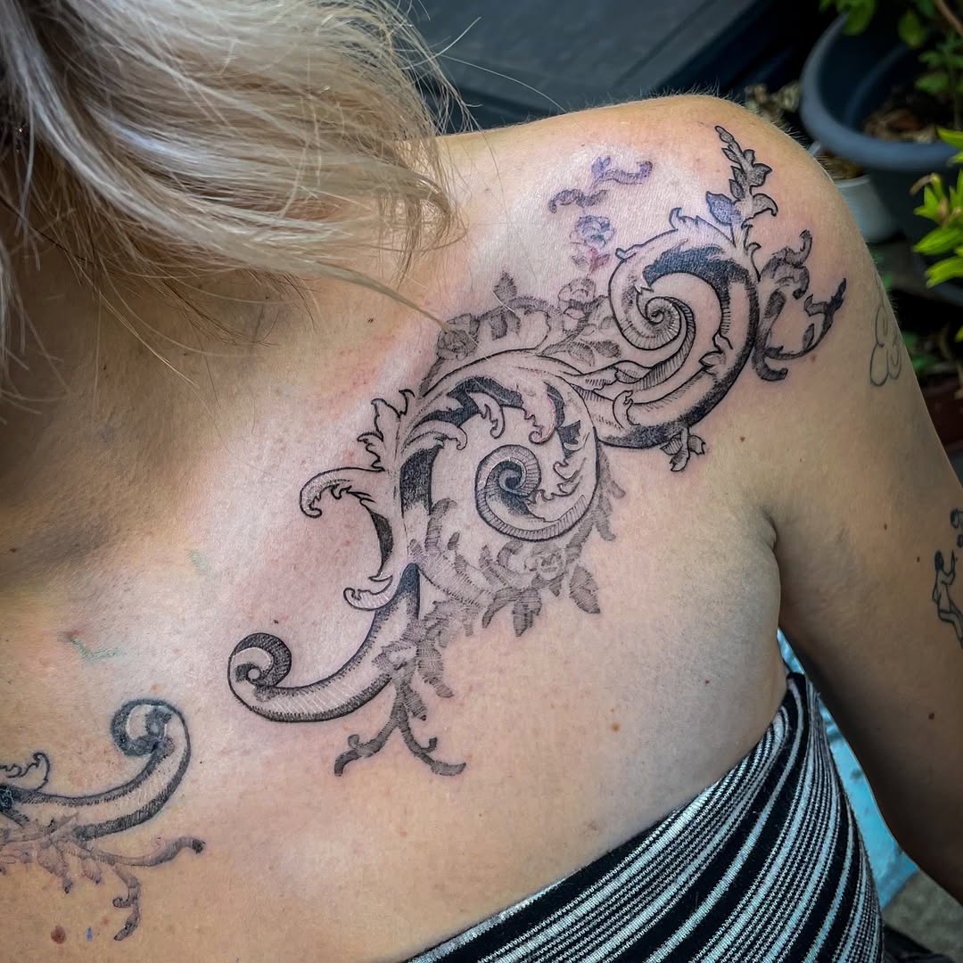 Tattoo by @sudo_tattoo — ornamental, black_and_grey