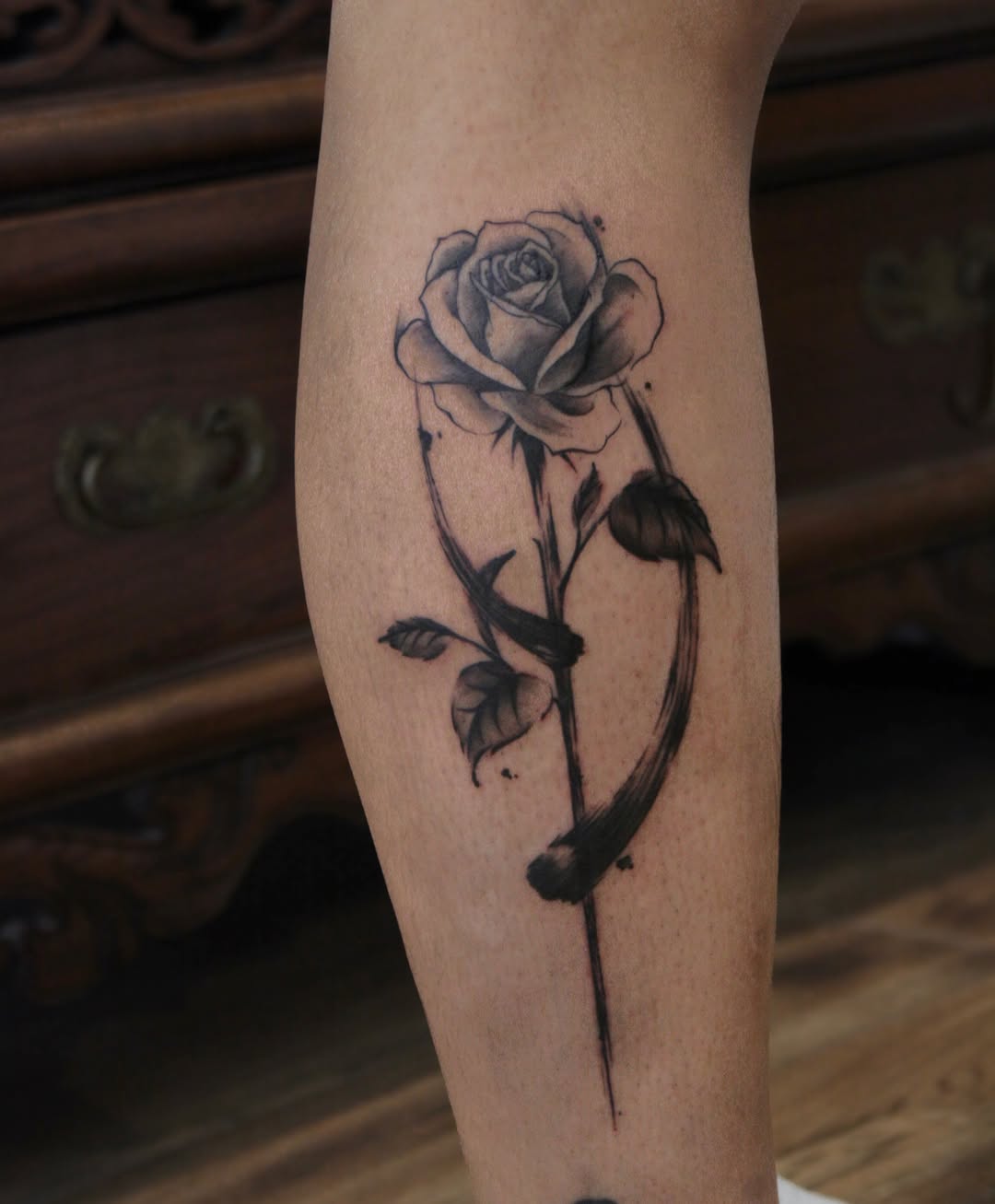 Tattoo by @oolong.ink — black_and_grey, illustrative