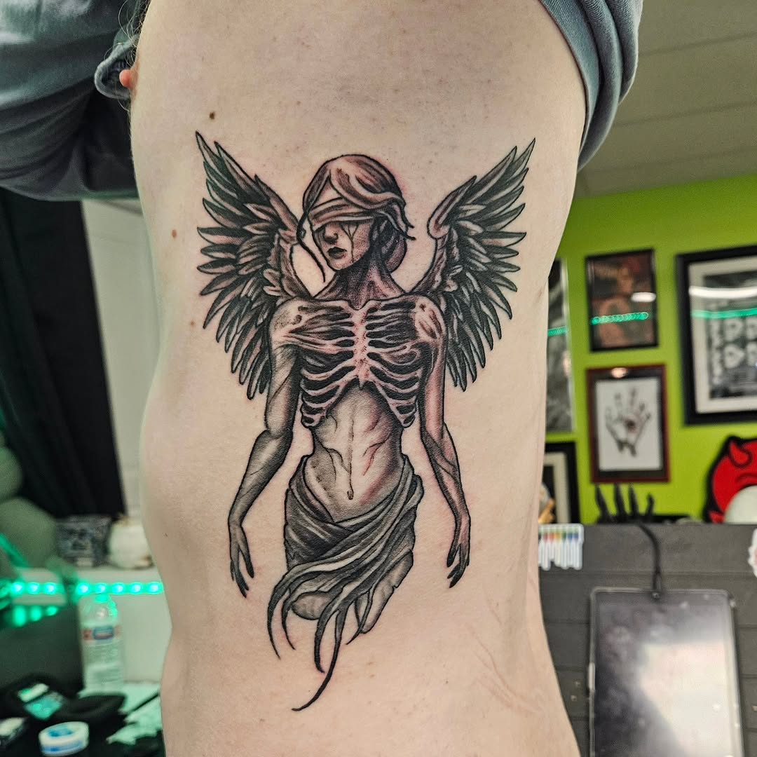 Tattoo by @goudyart — dark_realism, black_and_grey