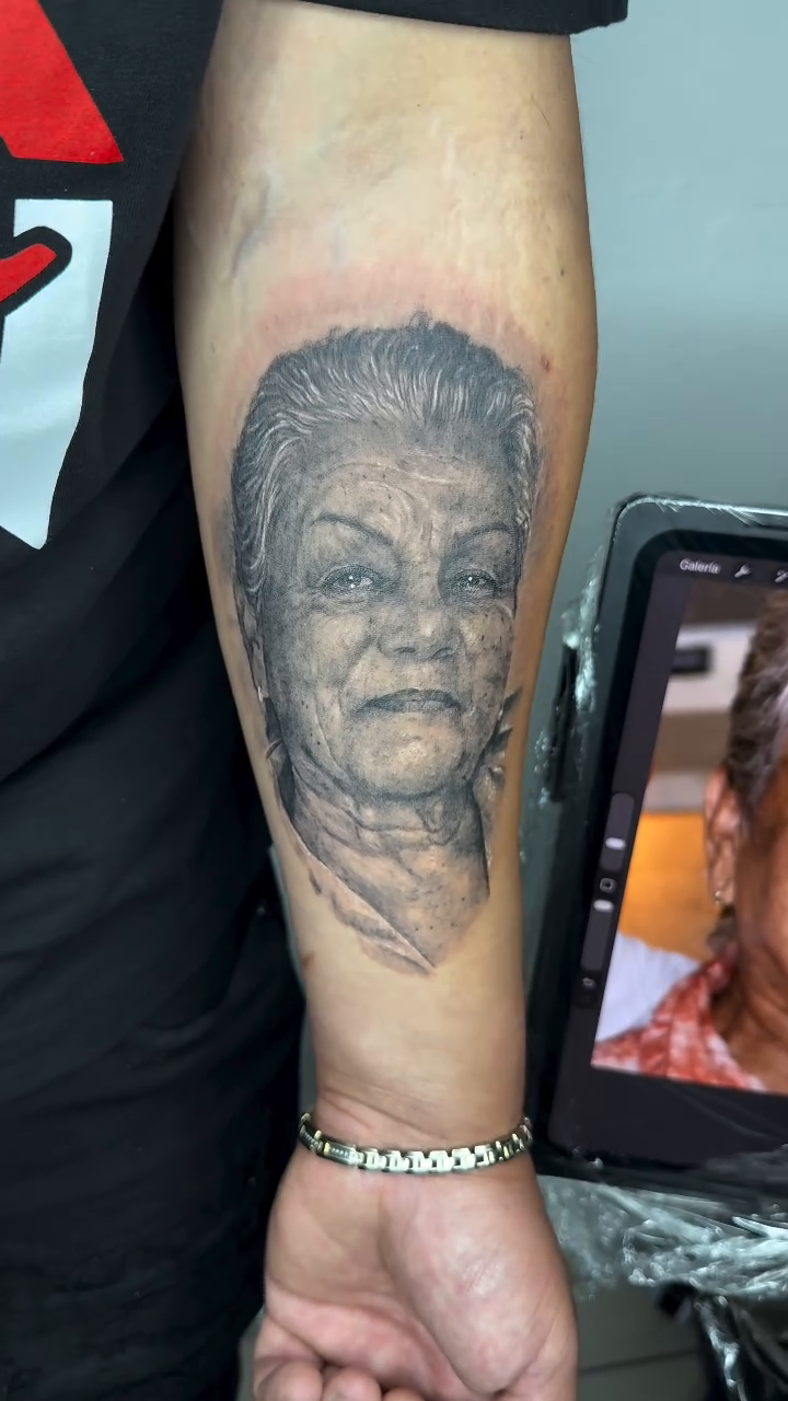 Tattoo by @elmertattoo1 β realism, black_and_grey