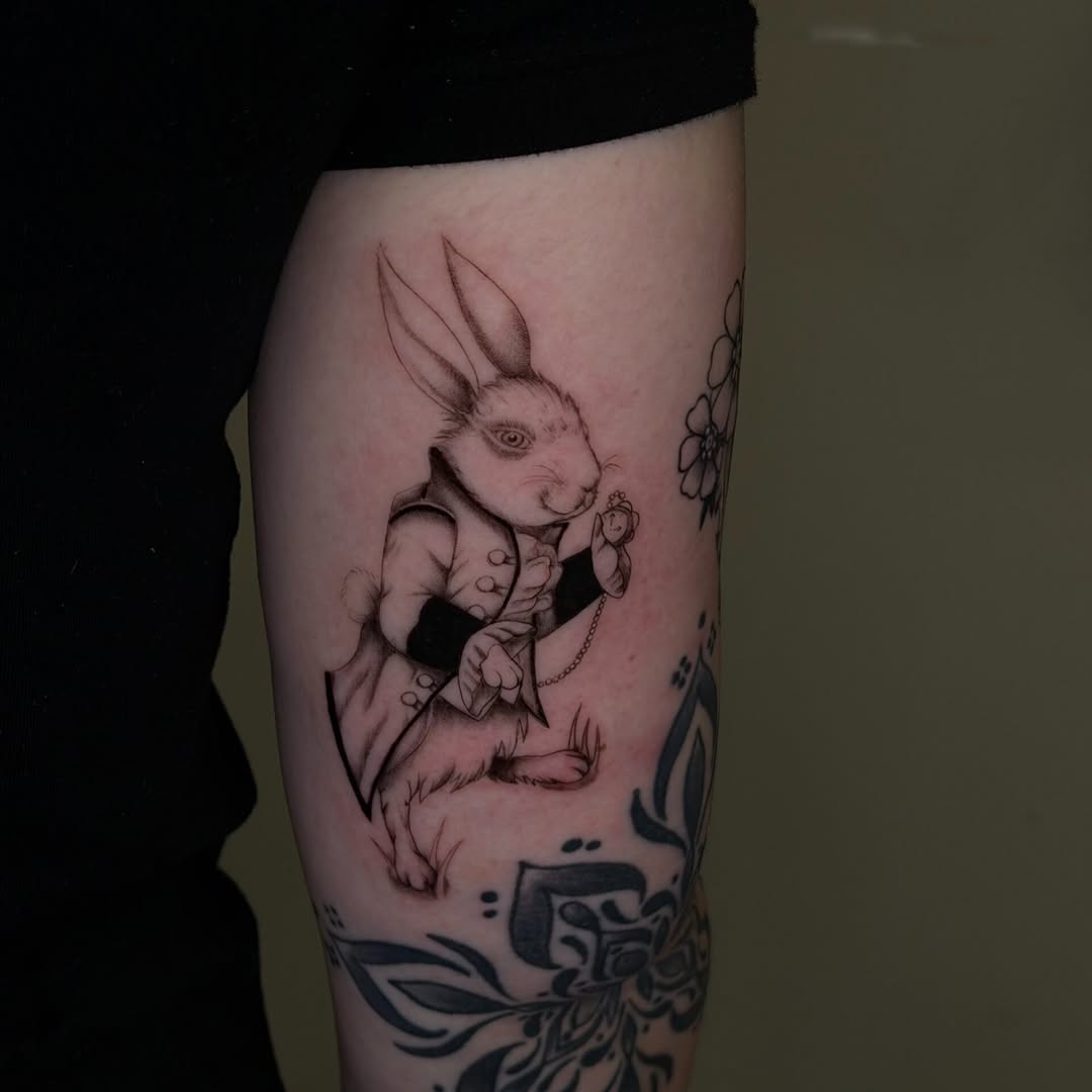 Tattoo by @izzyinktattoos_ — realism, black_and_grey