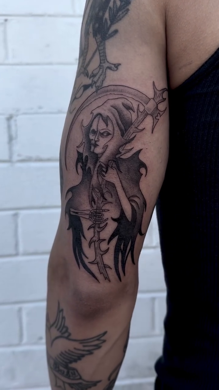 Tattoo by @skeletonvelvet — black_and_grey, realism