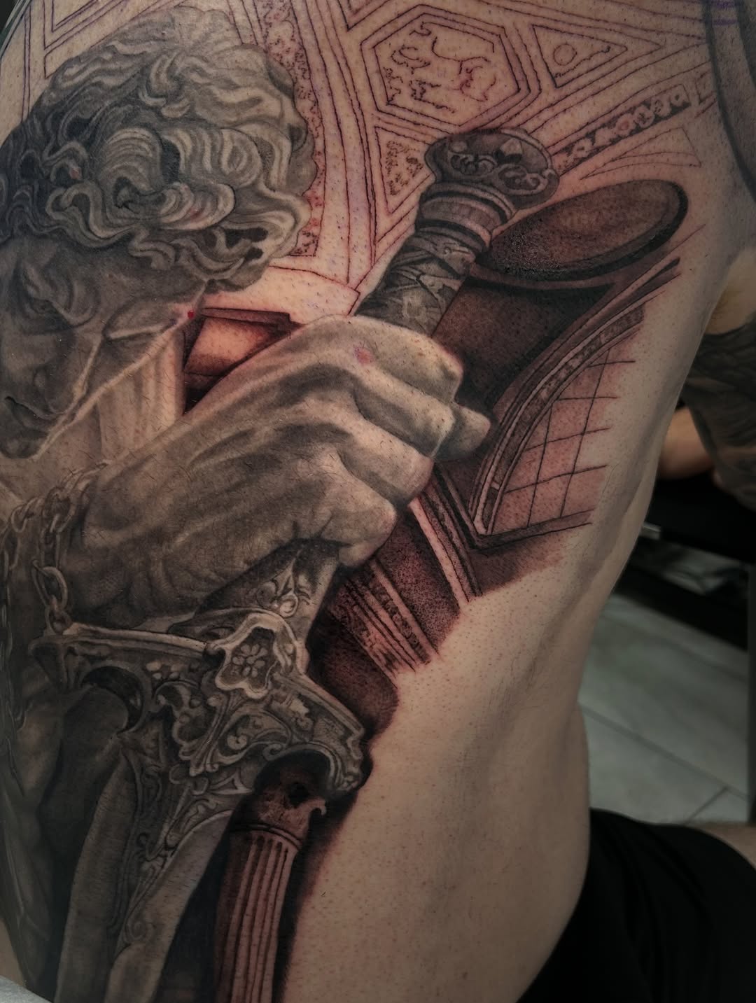 Tattoo by @the_buza — realism, black_and_grey