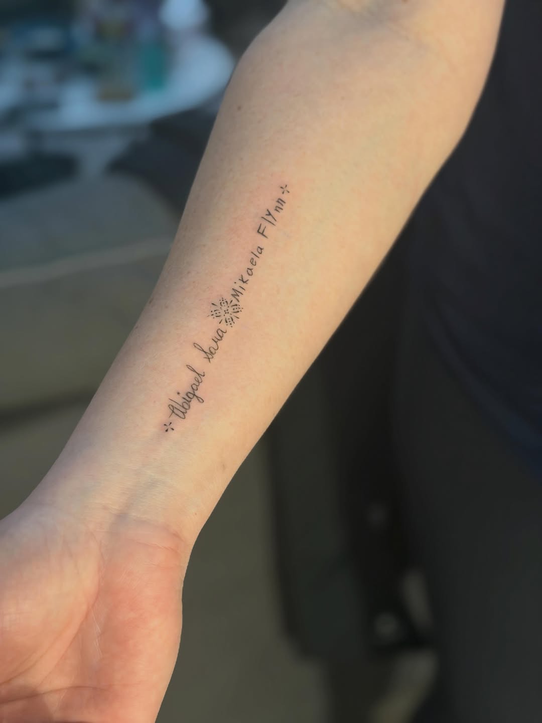 Tattoo by @aleks.north.tattoo — lettering_script, fine_line