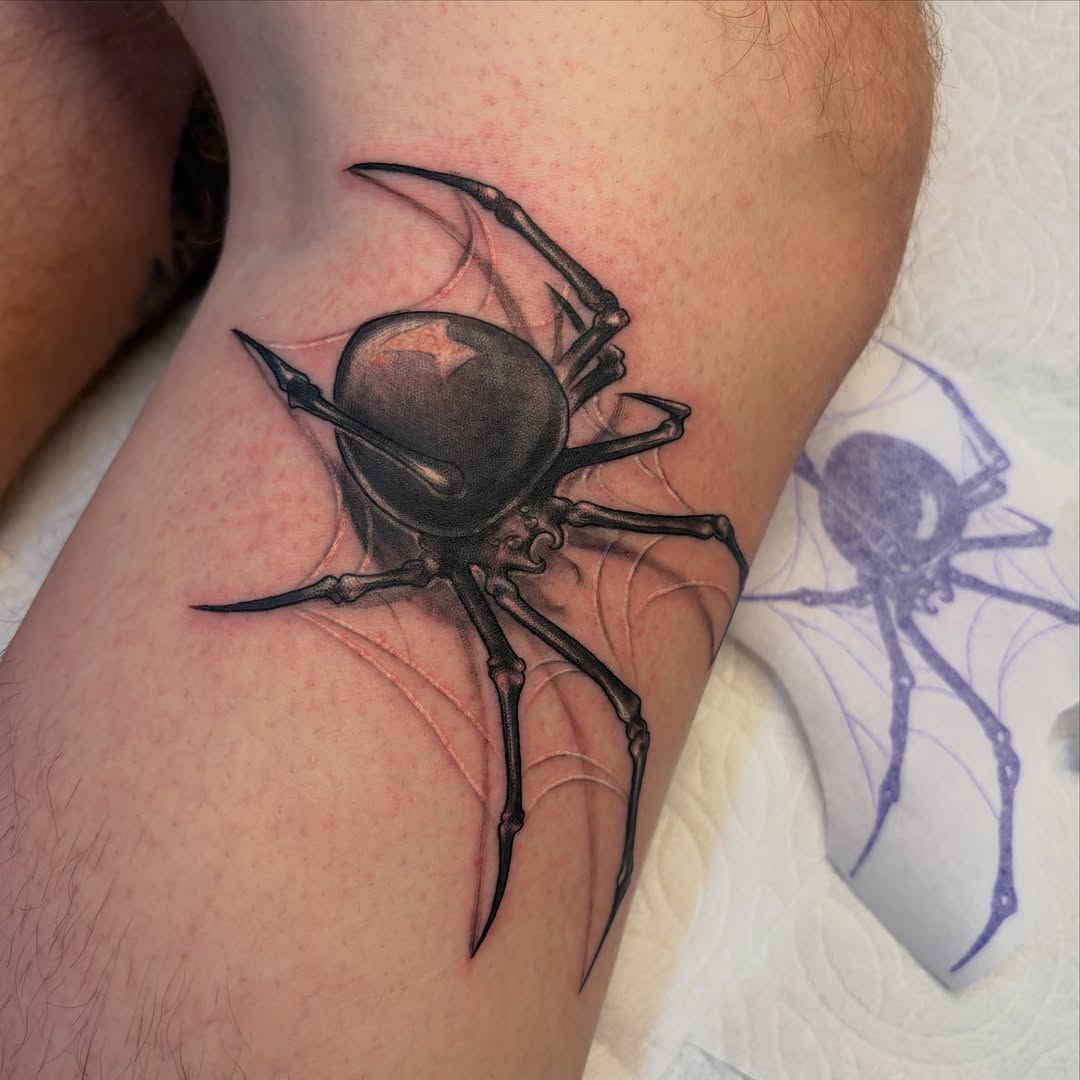 Tattoo by @et._.go._.tattoo — realism, black_and_grey